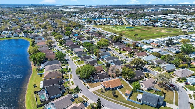 aerial view featuring a water view and a residential view