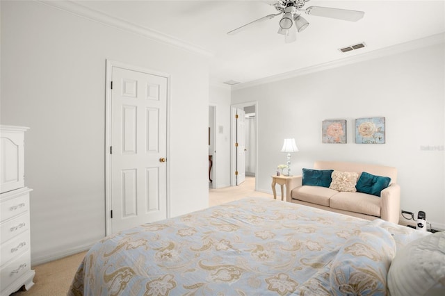 bedroom with light carpet, a ceiling fan, visible vents, and crown molding