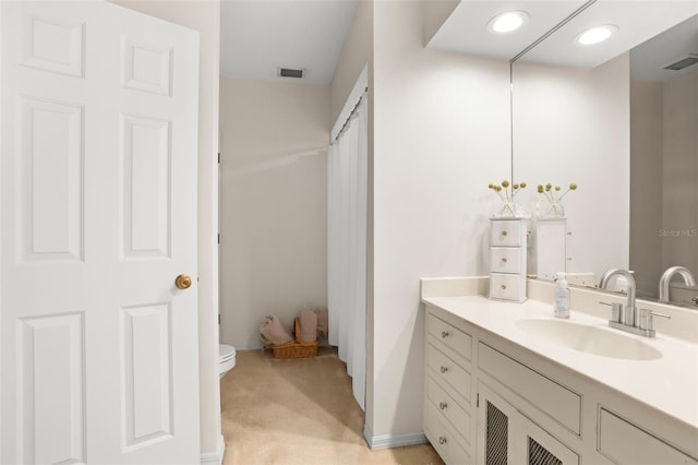 full bath with toilet, recessed lighting, visible vents, and vanity