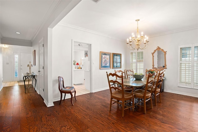 dining area with plenty of natural light and wood finished floors