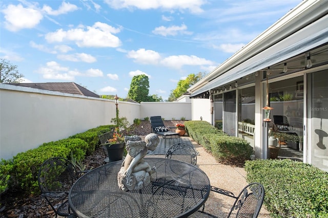 view of patio / terrace with a fenced backyard and outdoor dining area