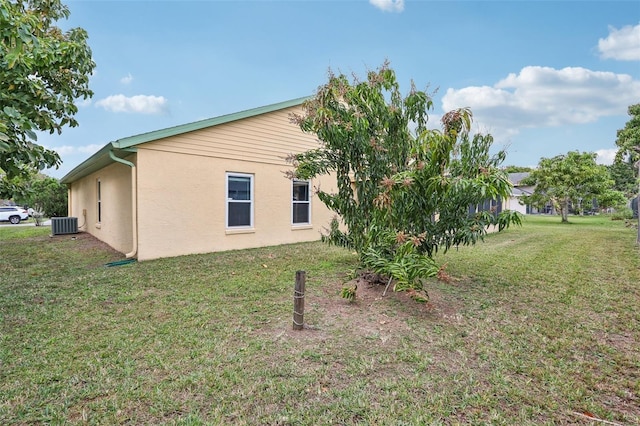 exterior space featuring central AC unit