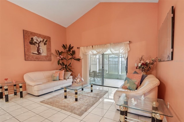 living room with tile patterned floors and high vaulted ceiling