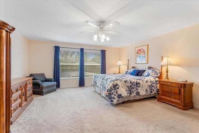 8606 Terrace Pines Ct, Orlando, FL 32836 - bedroom featuring baseboards, a textured ceiling, a ceiling fan, and carpet flooring