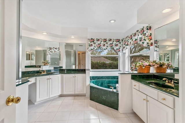 8606 Terrace Pines Ct, Orlando, FL 32836 - bathroom featuring a stall shower, tile patterned floors, a sink, and a bath