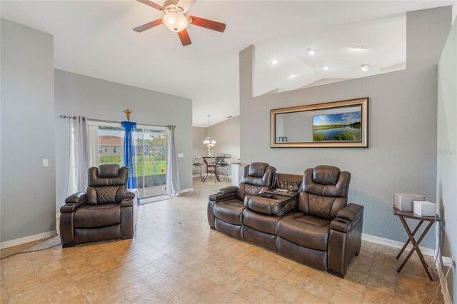 2851 Stonewood Cir, Lakeland, FL 33810 - living area with baseboards, vaulted ceiling, and a ceiling fan
