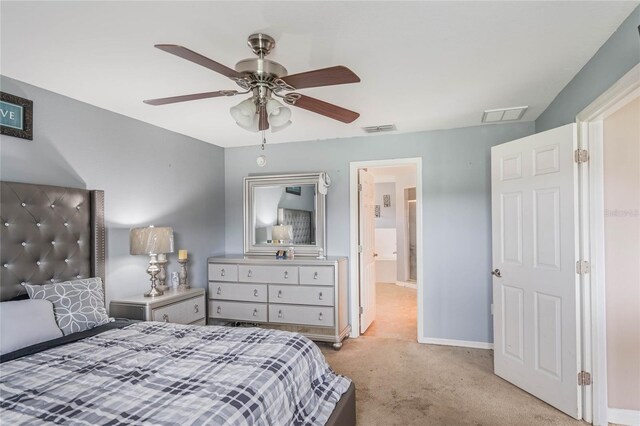 2851 Stonewood Cir, Lakeland, FL 33810 - carpeted bedroom with a ceiling fan, visible vents, and baseboards