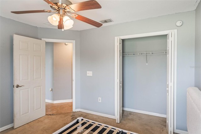 2851 Stonewood Cir, Lakeland, FL 33810 - unfurnished bedroom featuring ceiling fan, visible vents, baseboards, a closet, and carpet