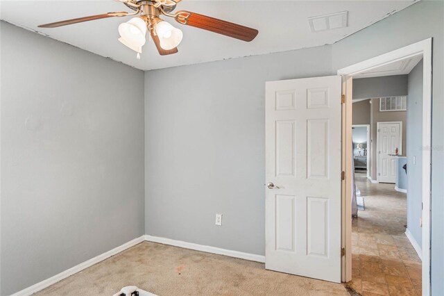 2851 Stonewood Cir, Lakeland, FL 33810 - carpeted spare room featuring ceiling fan, visible vents, and baseboards