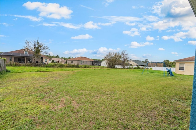 2851 Stonewood Cir, Lakeland, FL 33810 - view of yard with a playground, fence, and a residential view