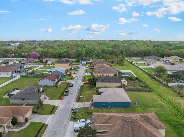 2851 Stonewood Cir, Lakeland, FL 33810 - bird's eye view featuring a wooded view and a residential view