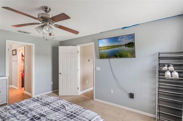 2851 Stonewood Cir, Lakeland, FL 33810 - carpeted bedroom featuring baseboards, visible vents, and a ceiling fan