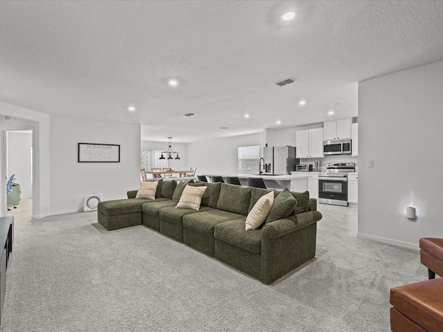 2925 SW 172nd Lane Rd, Ocala, FL 34473 - living area with recessed lighting, visible vents, plenty of natural light, and light colored carpet