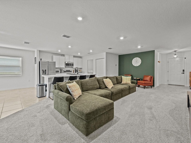 2925 SW 172nd Lane Rd, Ocala, FL 34473 - living area with visible vents, recessed lighting, and a textured ceiling