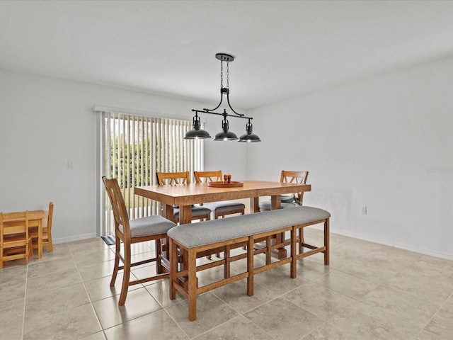 2925 SW 172nd Lane Rd, Ocala, FL 34473 - dining room featuring light tile patterned floors and baseboards