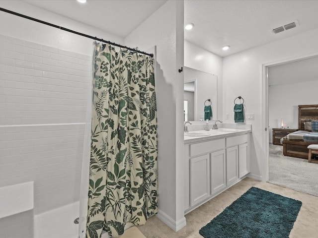 2925 SW 172nd Lane Rd, Ocala, FL 34473 - ensuite bathroom featuring visible vents, a shower with shower curtain, ensuite bathroom, and a sink