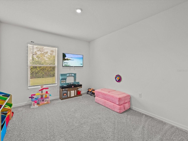 2925 SW 172nd Lane Rd, Ocala, FL 34473 - playroom with carpet flooring and baseboards
