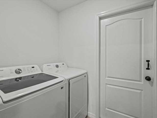 2925 SW 172nd Lane Rd, Ocala, FL 34473 - laundry area with washing machine and clothes dryer and laundry area