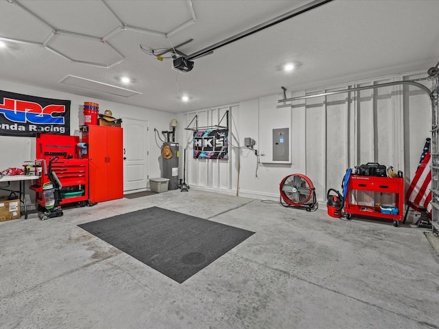 2925 SW 172nd Lane Rd, Ocala, FL 34473 - garage with electric panel, a garage door opener, and electric water heater