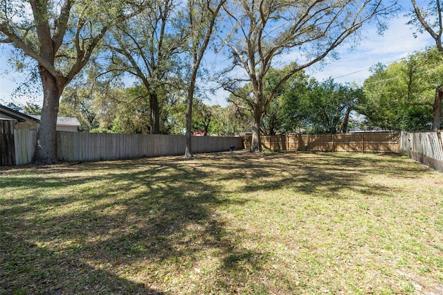 view of yard featuring a fenced backyard