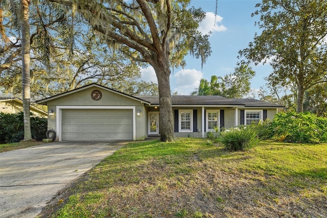 ranch-style home featuring stucco siding, an attached garage, concrete driveway, and a front lawn