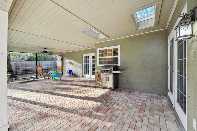 101 Ludlow Dr, Longwood, FL 32779 - view of patio featuring a ceiling fan, french doors, and fence
