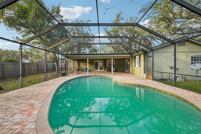 101 Ludlow Dr, Longwood, FL 32779 - view of swimming pool with a patio area, french doors, a lanai, and fence