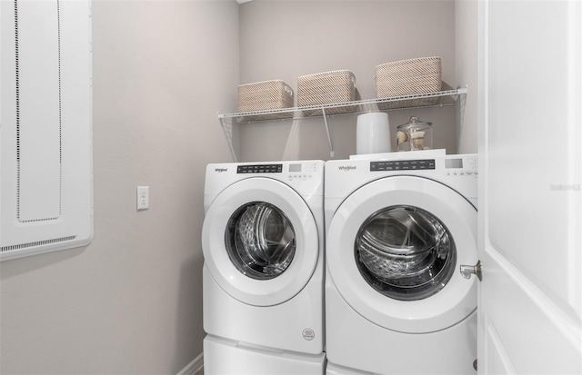 laundry area with washer and dryer and laundry area