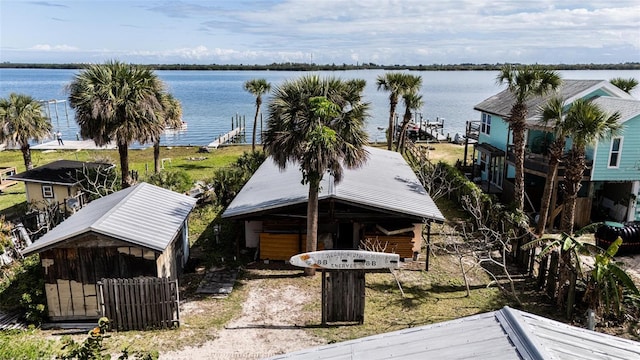 exterior space with a water view