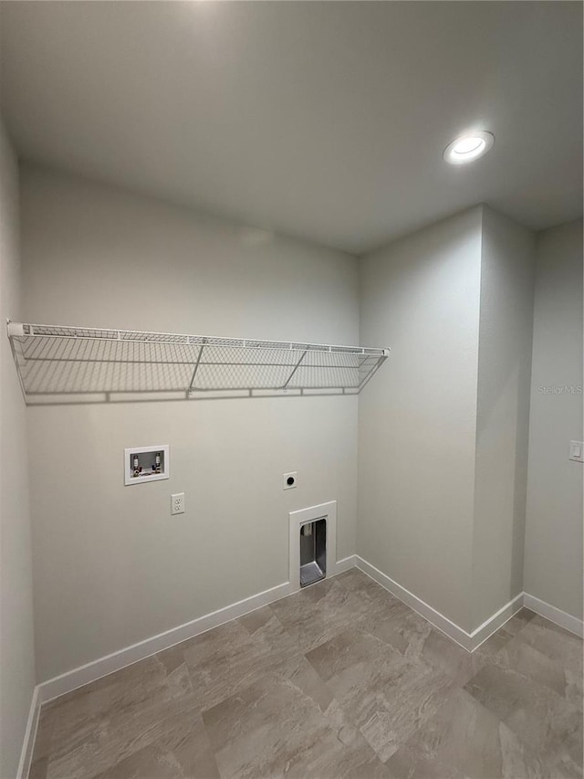 clothes washing area featuring washer hookup, recessed lighting, electric dryer hookup, laundry area, and baseboards