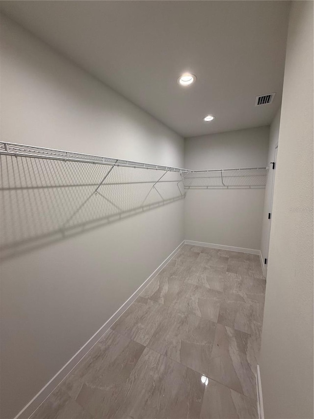 spacious closet with visible vents