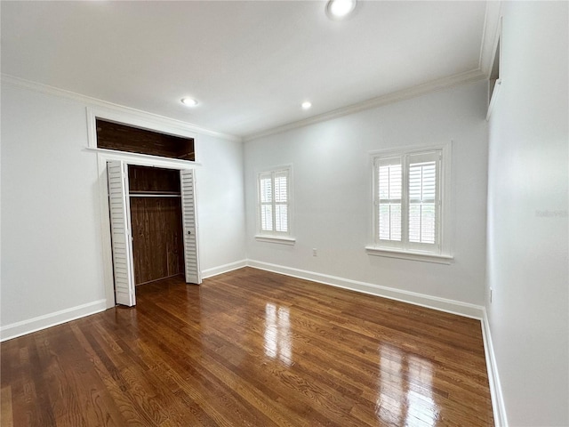 3025 W N A St, Tampa, FL 33609 - unfurnished bedroom featuring crown molding, dark wood-style floors, and baseboards