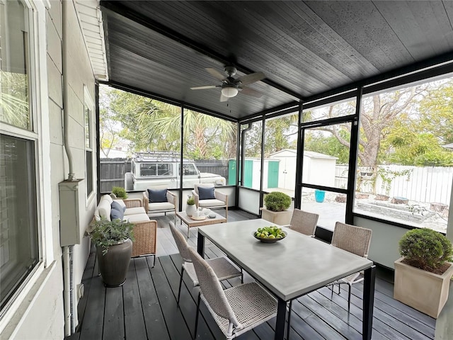 3025 W N A St, Tampa, FL 33609 - sunroom featuring outdoor dining space, an outdoor hangout area, and a ceiling fan