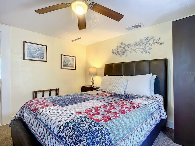 bedroom featuring carpet, visible vents, and ceiling fan