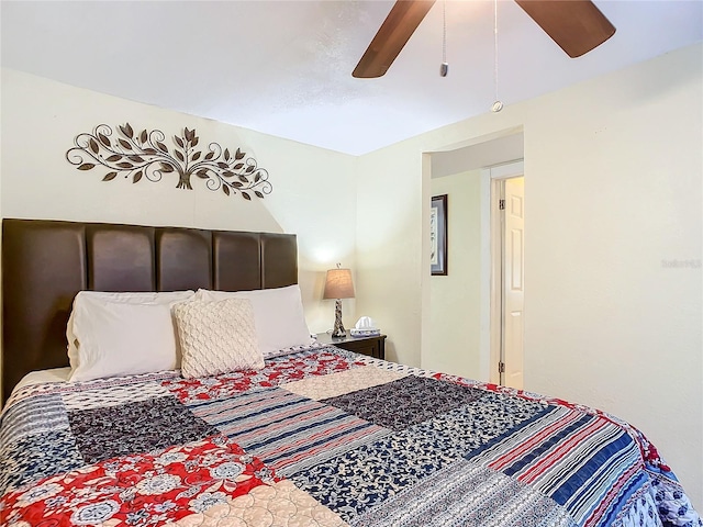 bedroom with ceiling fan and lofted ceiling