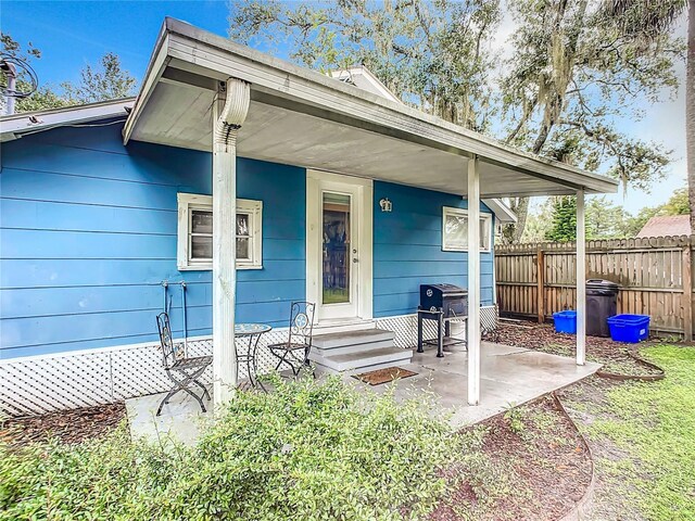 property entrance with fence