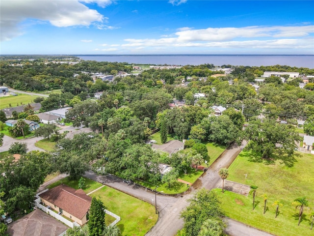 drone / aerial view with a water view