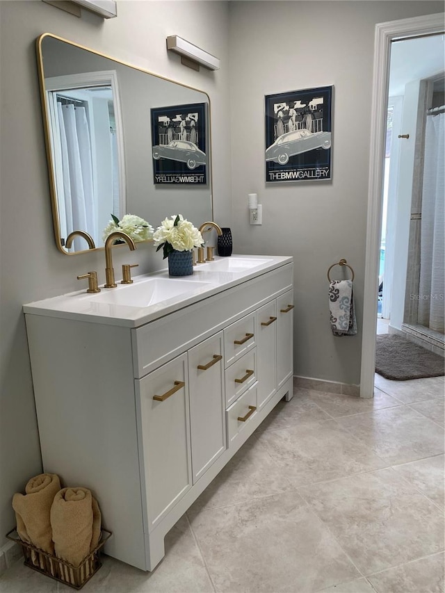 bathroom featuring double vanity and a sink