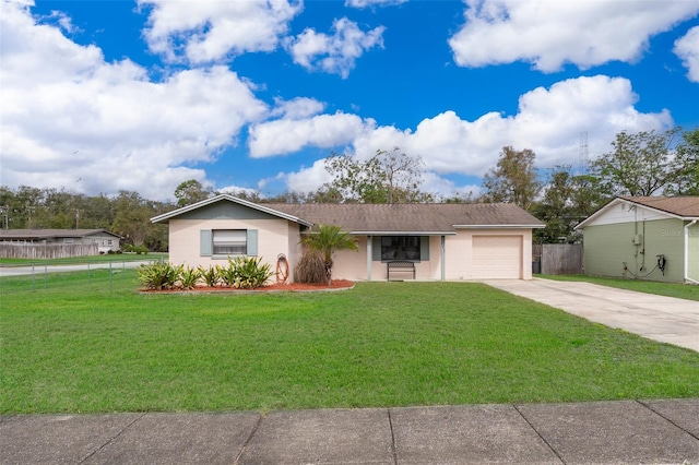 single story home with a garage, driveway, a front lawn, and fence