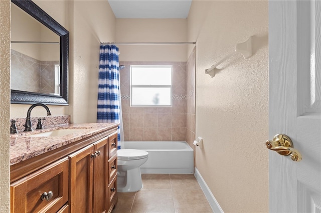 bathroom with toilet, shower / tub combo, vanity, baseboards, and tile patterned floors