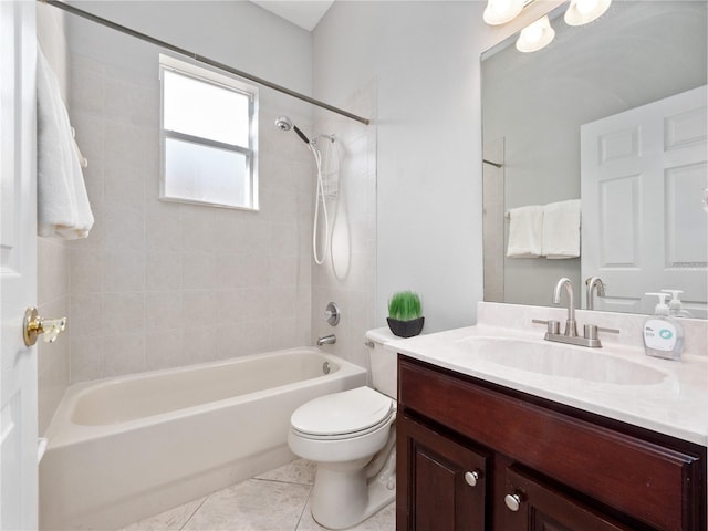 full bathroom with tile patterned flooring, shower / washtub combination, toilet, and vanity