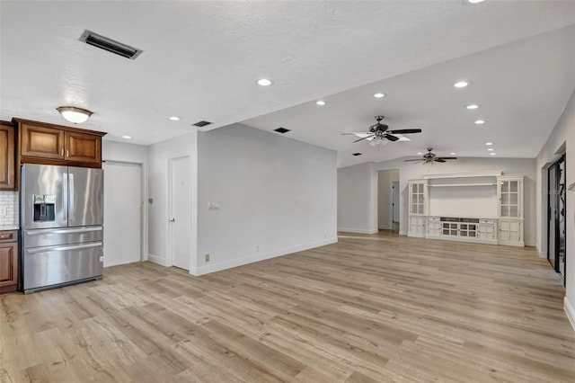 2502 SW 23rd Cranbrook Dr, Boynton Beach, FL 33436 - unfurnished living room with recessed lighting, visible vents, light wood-type flooring, and baseboards