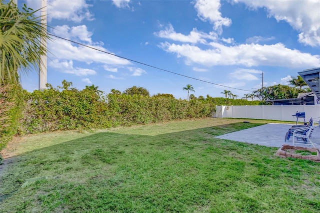 2502 SW 23rd Cranbrook Dr, Boynton Beach, FL 33436 - view of yard with a fenced backyard and a patio