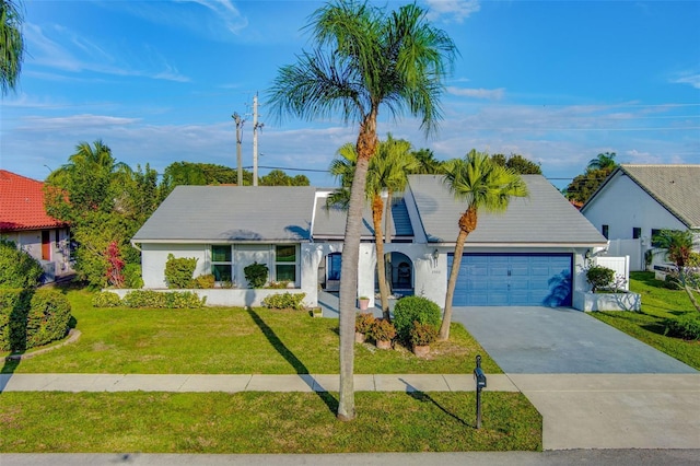 2502 SW 23rd Cranbrook Dr, Boynton Beach, FL 33436 - view of front of property with stucco siding, driveway, a front lawn, a garage, and fence