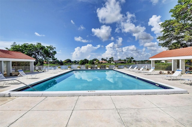 2502 SW 23rd Cranbrook Dr, Boynton Beach, FL 33436 - community pool featuring a patio and fence