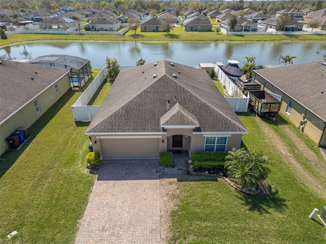 aerial view with a residential view and a water view