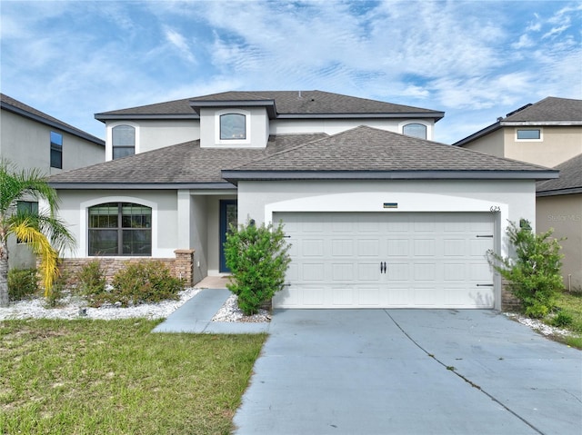 view of front of home with a shingled roof, concrete driveway, stucco siding, stone siding, and an attached garage