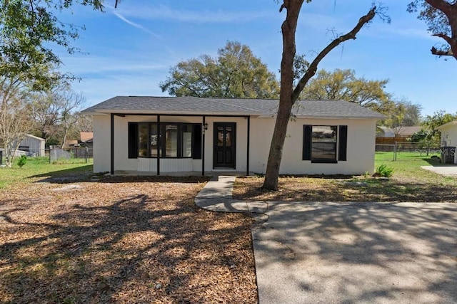 view of front of home with fence