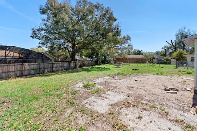 view of yard with fence