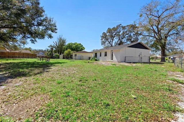 view of yard with fence